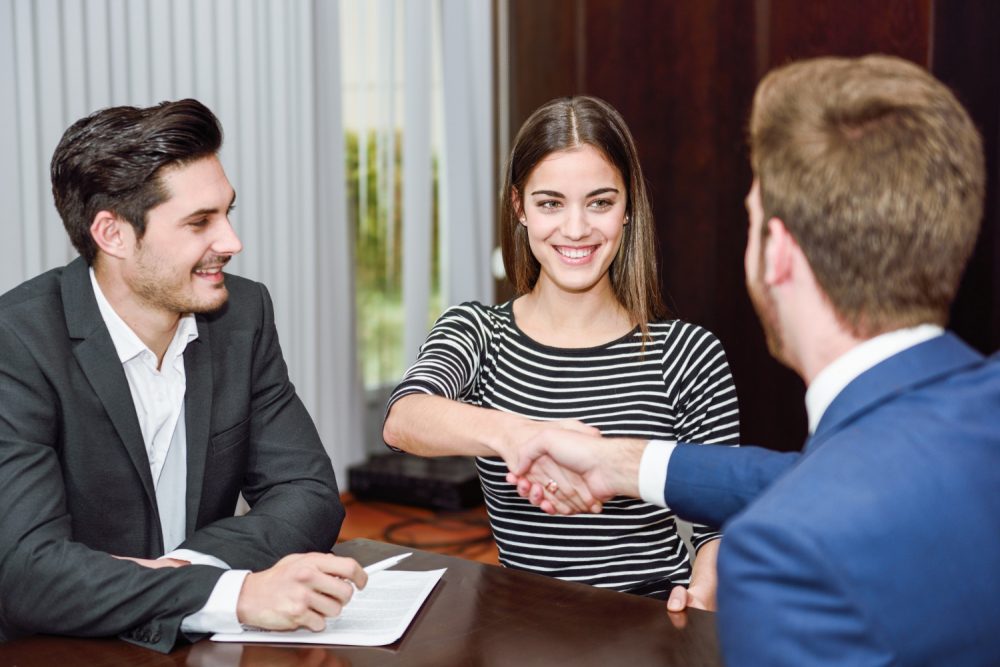 businessmen-with-new-employee
